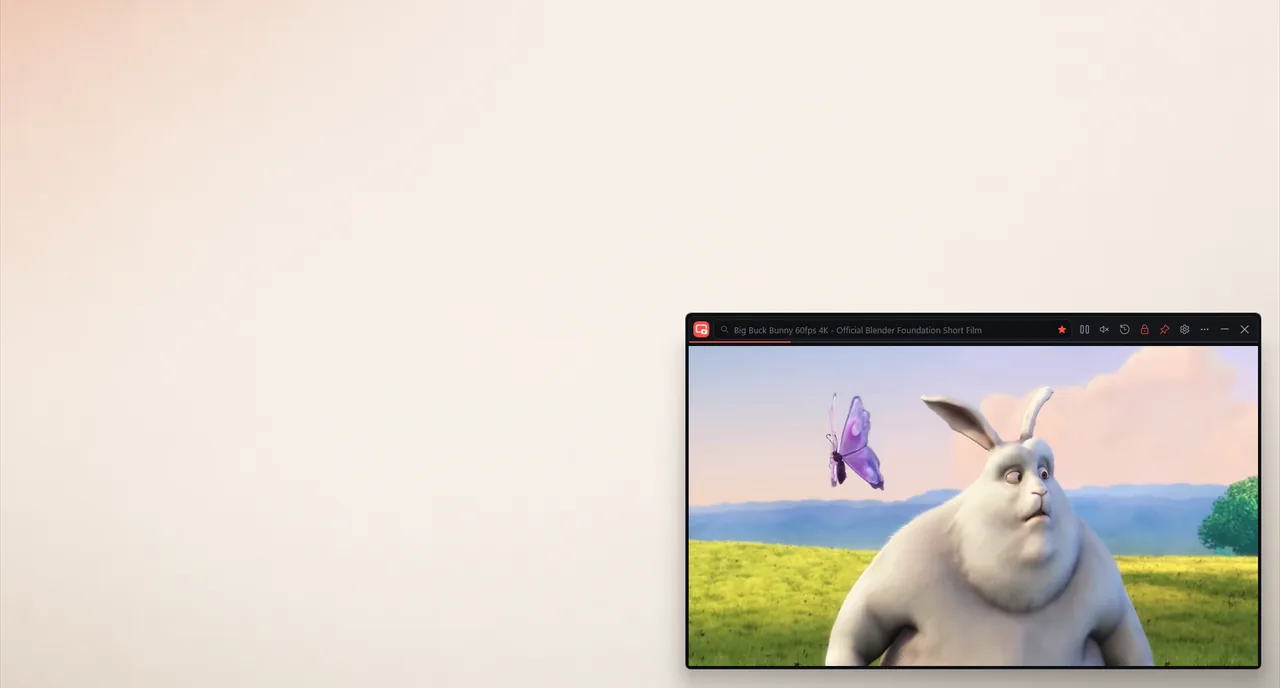 Рабочий стол Windows: в правом нижнем углу окно DeskTubo с мультфильмом, над ним панель с поиском и кнопками